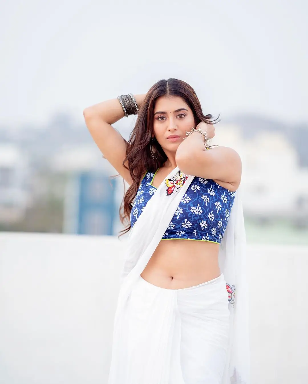 Rashi Singh in White Saree Blue Sleeveless Blouse